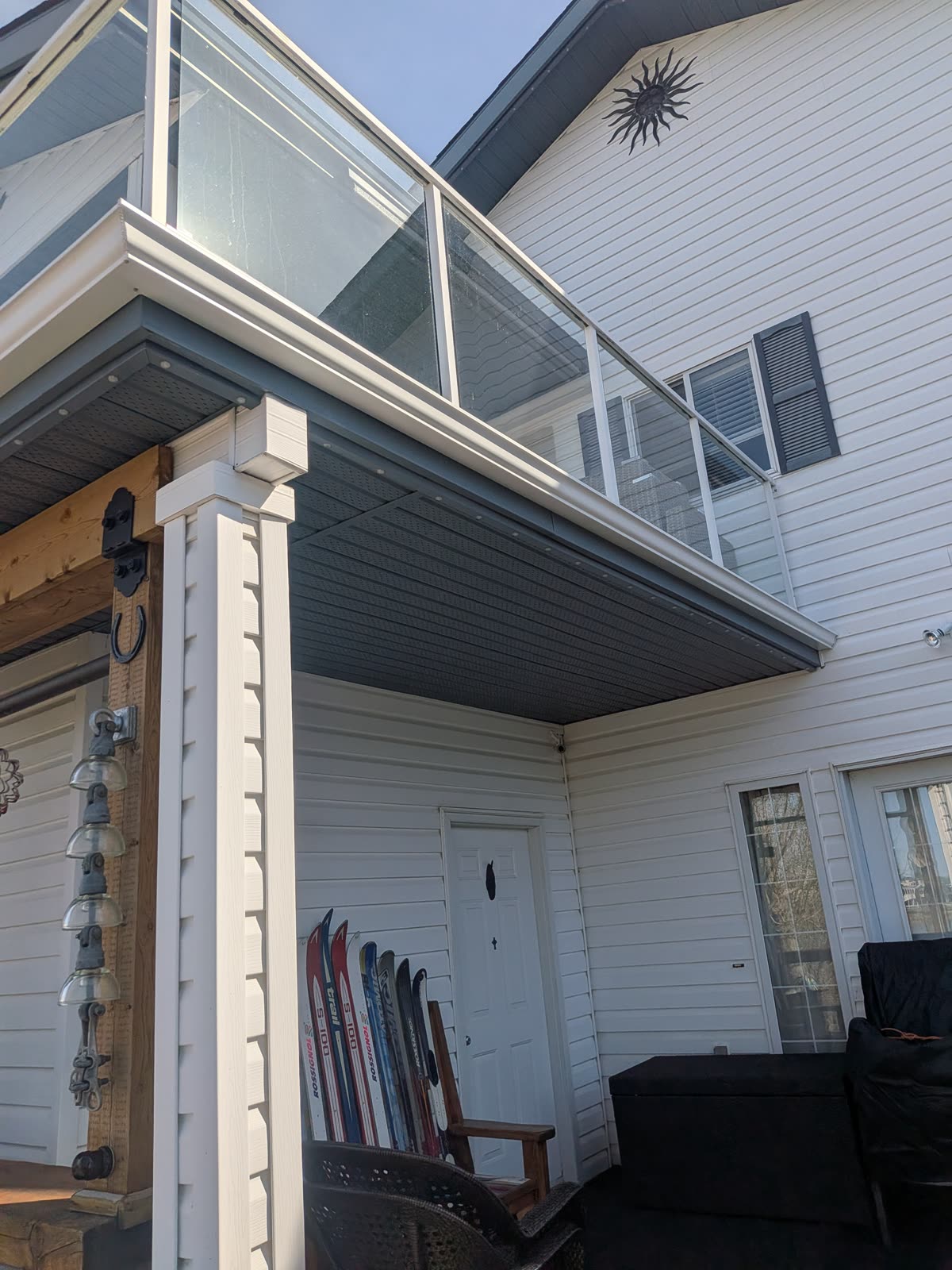 Completed downspout and gutter system on deck home