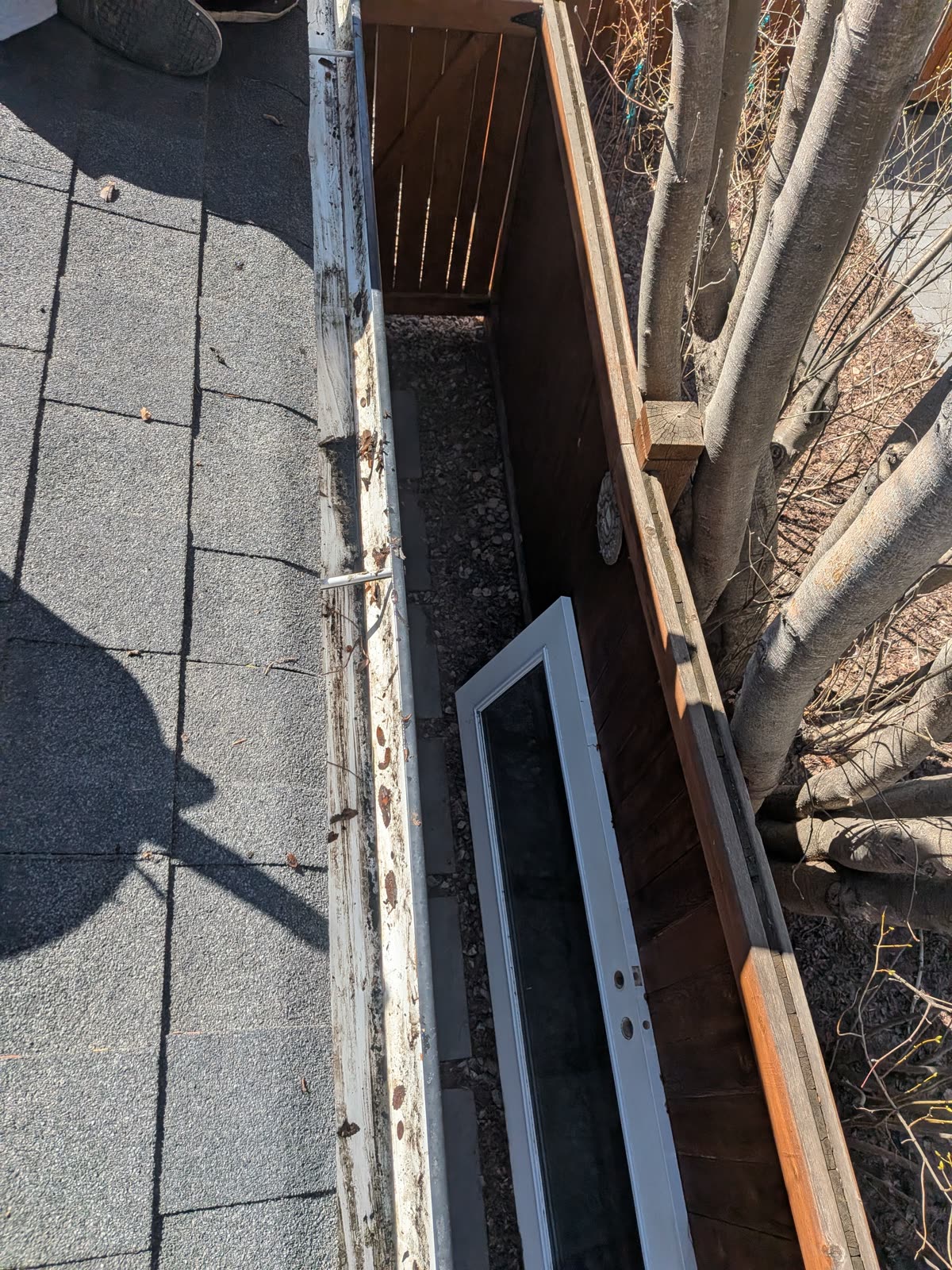 Cleared eavestrough with restored drainage path