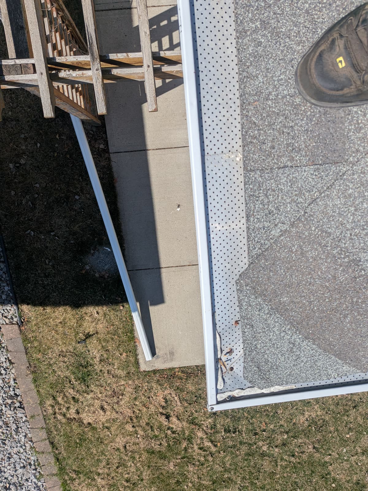 Gutter cleaning job on residential roofline