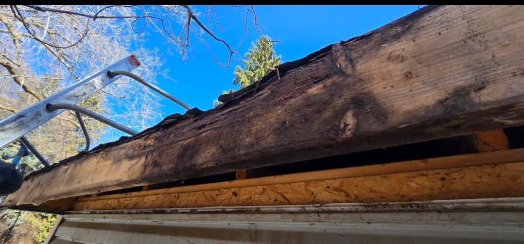 Completed eavestrough installation along roofline