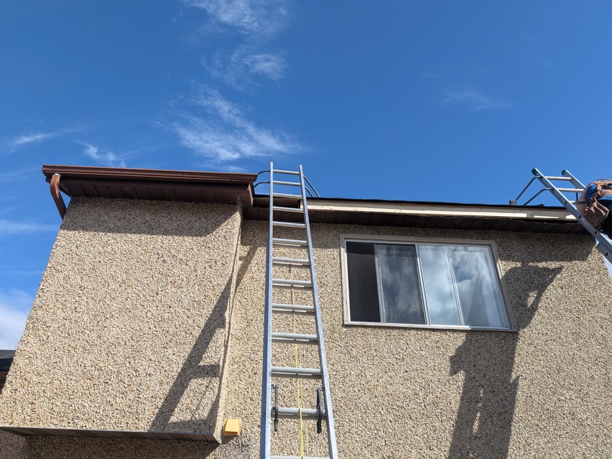 Completed gutter installation on two-storey home
