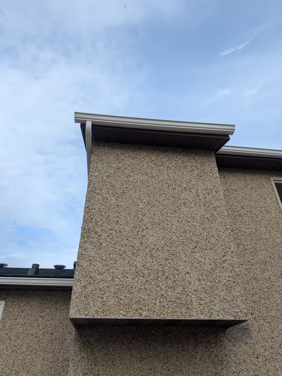 Finished gutter and downspout installation